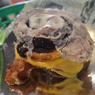 Cinnamon Roll Stuffed Breakfast Sandwich